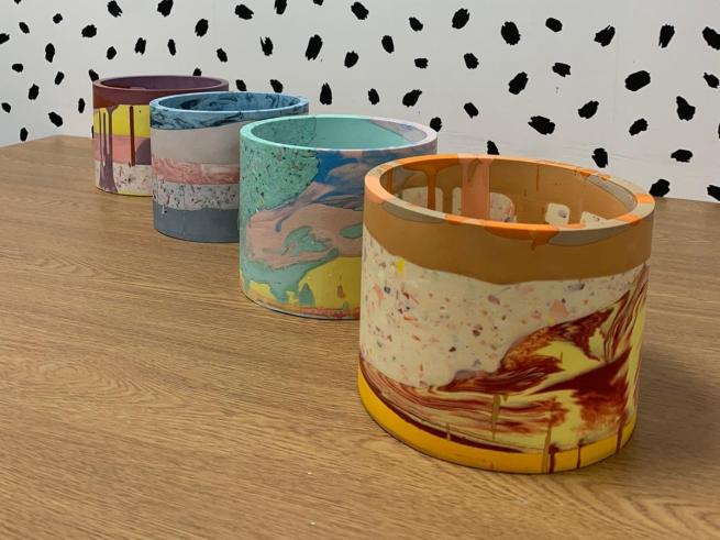 3 colourful plant pots made from Jesmonite.