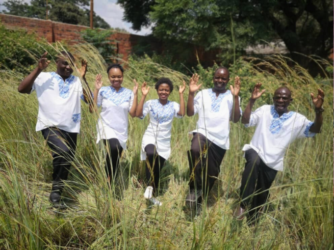 Black Umfolosi press shot, they're all dancing.