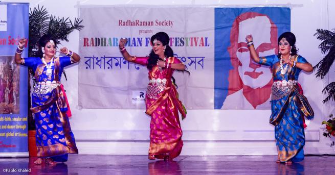A group of three women dancing