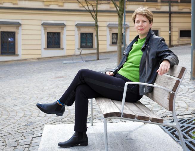 Woman sat on a bench