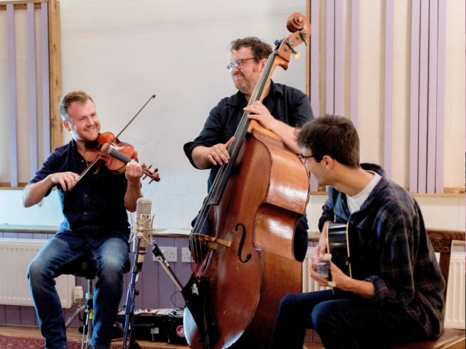 Sam Sweeney Trio performing live.