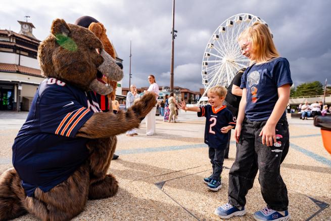 Staley Da Bear and young Bears' fans