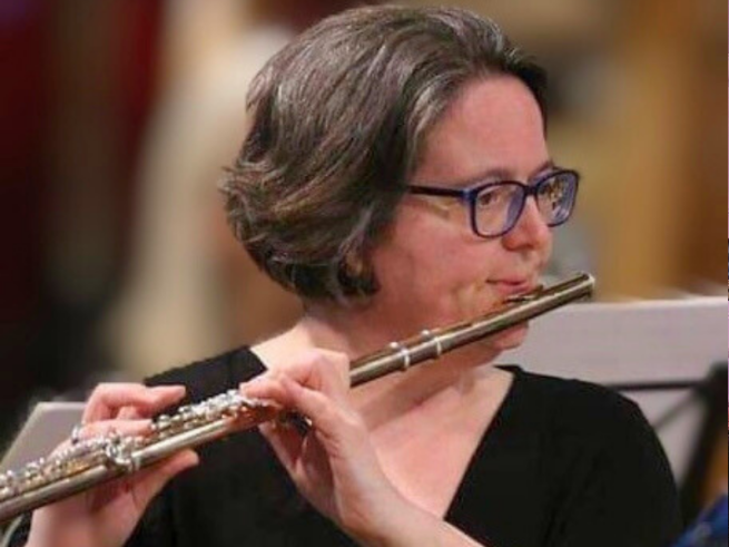 Emma Cordell playing the flute.