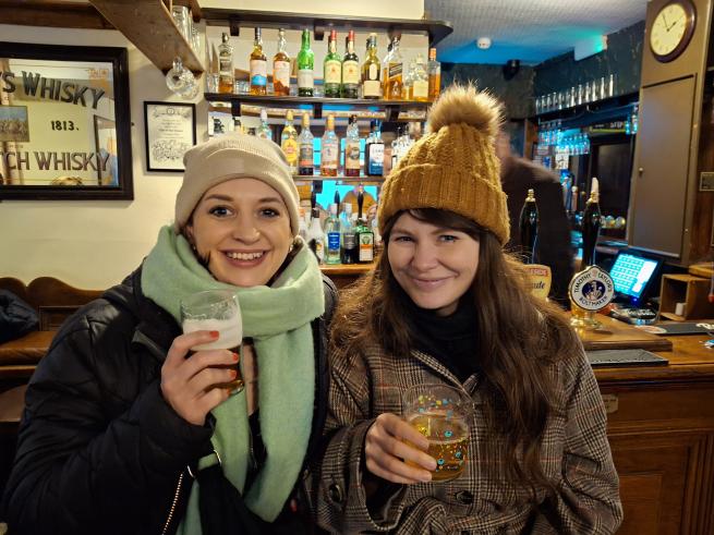 Two women drinking in a pub