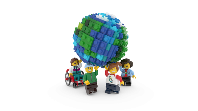 Mini LEGO figures holding up a mini LEGO earth