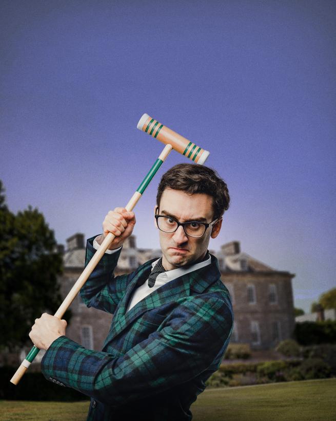 MC Hammersmith holding a croquet mallet in a menacing way!