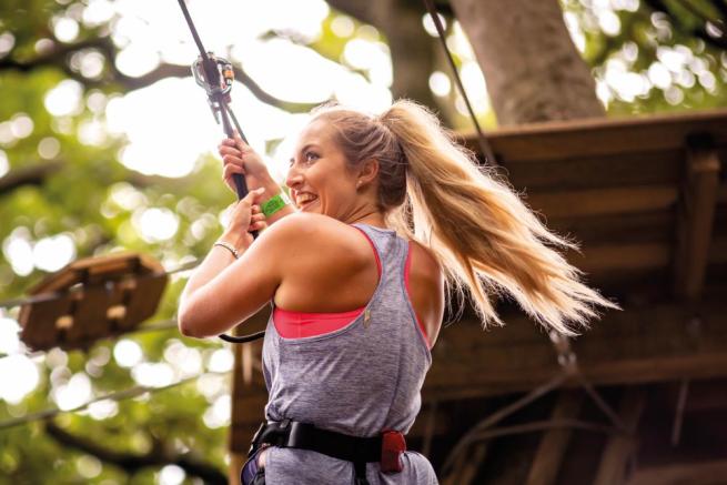 Women on Tarzan Swing at Go Ape Temple Newsam