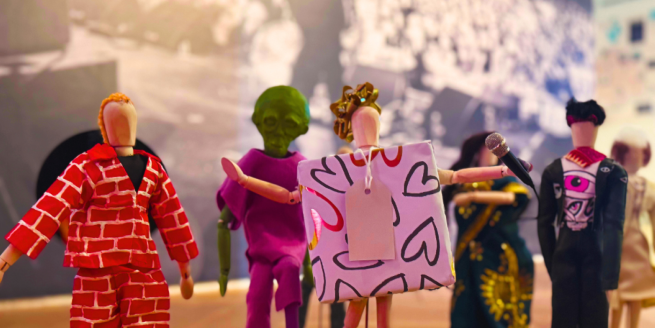 Mini mannequins with hand-made musician costumes on