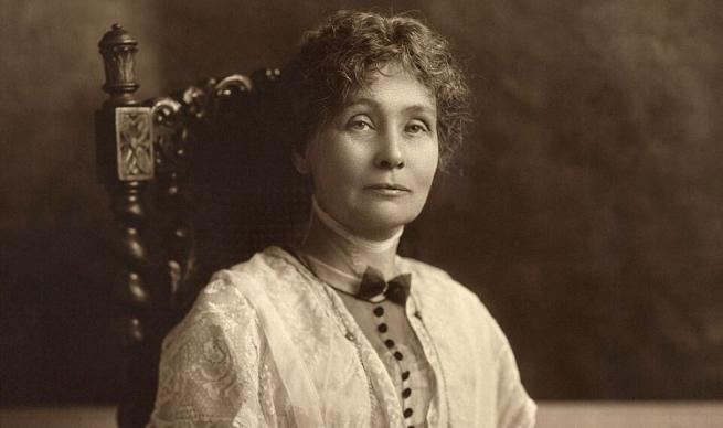 Emmeline Pankhurst sits majestically in a chair