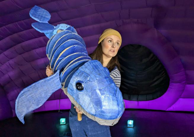 Puppeteer with a swimming whale