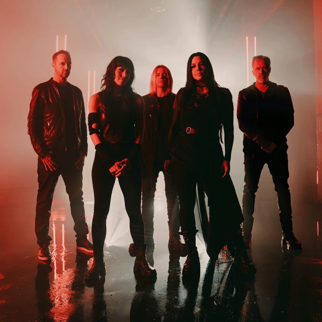 Evanescence band in a dark room with red strobe lighting
