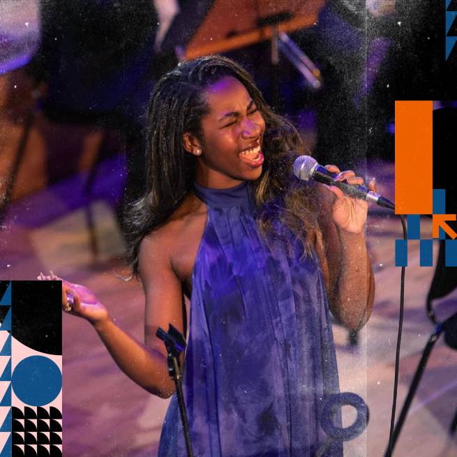 Lucy-Anne Daniels performing on stage. 