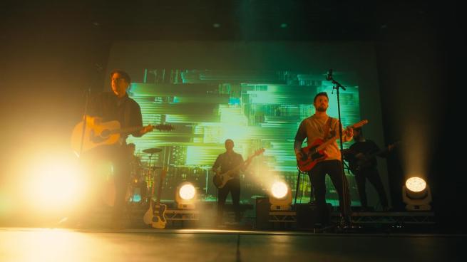 Portrait of he band on stage