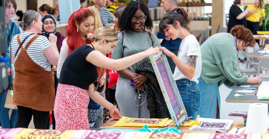 Young people screen printing