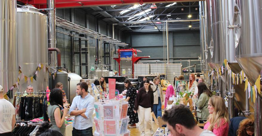Mindful Market in full swing with shoppers browsing each stall holder.