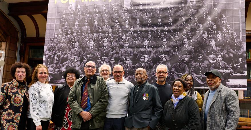 Alford Gardner (1926-2024), front centre wearing his medals, with veterans' relatives at the 2023 For King, Country & Home exhibition.
