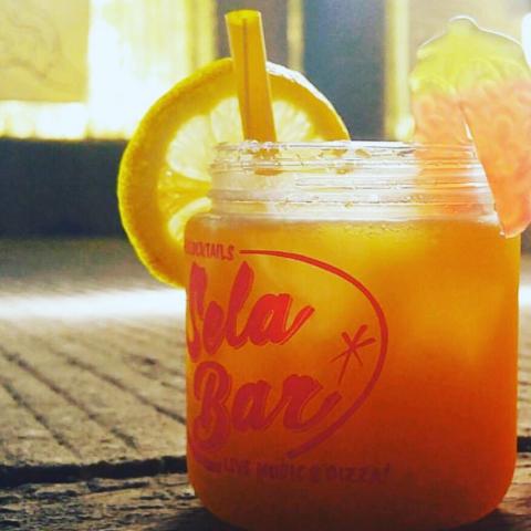 Sela opened in 2004 with an idea to provide quality imported beers from around the world, fun cocktails to compliment the beer selections and a stage for the region’s finest and most talented musicians to play on.Over ten years later, we’re still all about the beer, cocktails, live music and pizza!We carry over a selection of over thirty different beers spanning the globe from Pickering with The Great Yorkshire Brewery’s Yorkshire Blackout, to New York with a selection from Brooklyn Brewery, and Belgium…