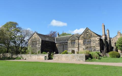 Landscape photograph of Oakwell Hall in a summer setting