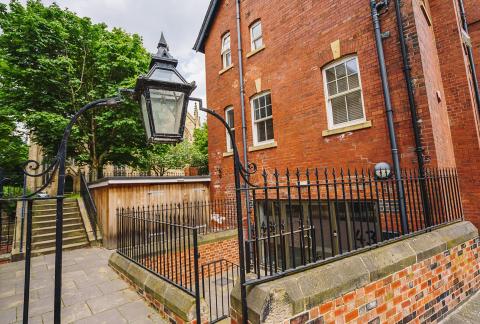 Leeds Church Institute is behind the Leeds Minster on 43 The Calls