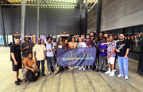 A group with the Angels of Freedom banner