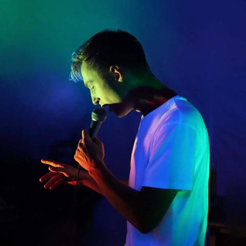 Lence Performing - Photo by Chris Kidd