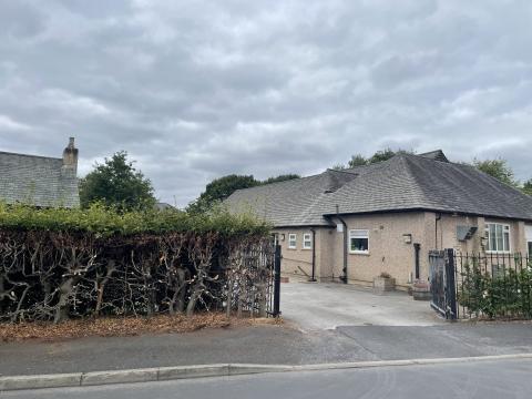 A community centre beside a church 