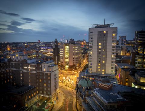 a view of the leeds city skyline at night 