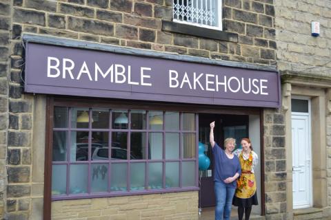 Bramble Bakehouse cafe front with owner and bake off contestant